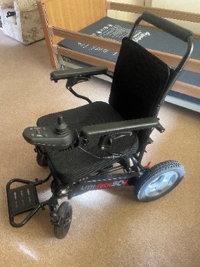 Electric folding wheelchair. Black Lith-Tech Smart Chair 1. Ramps included.