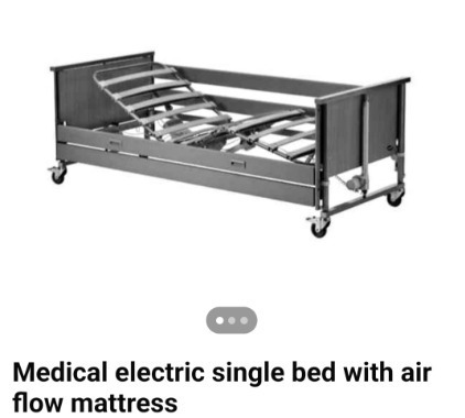 Invarcare rise and fall bed with air mattress